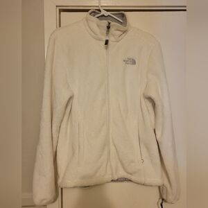 White plush The North Face jacket.